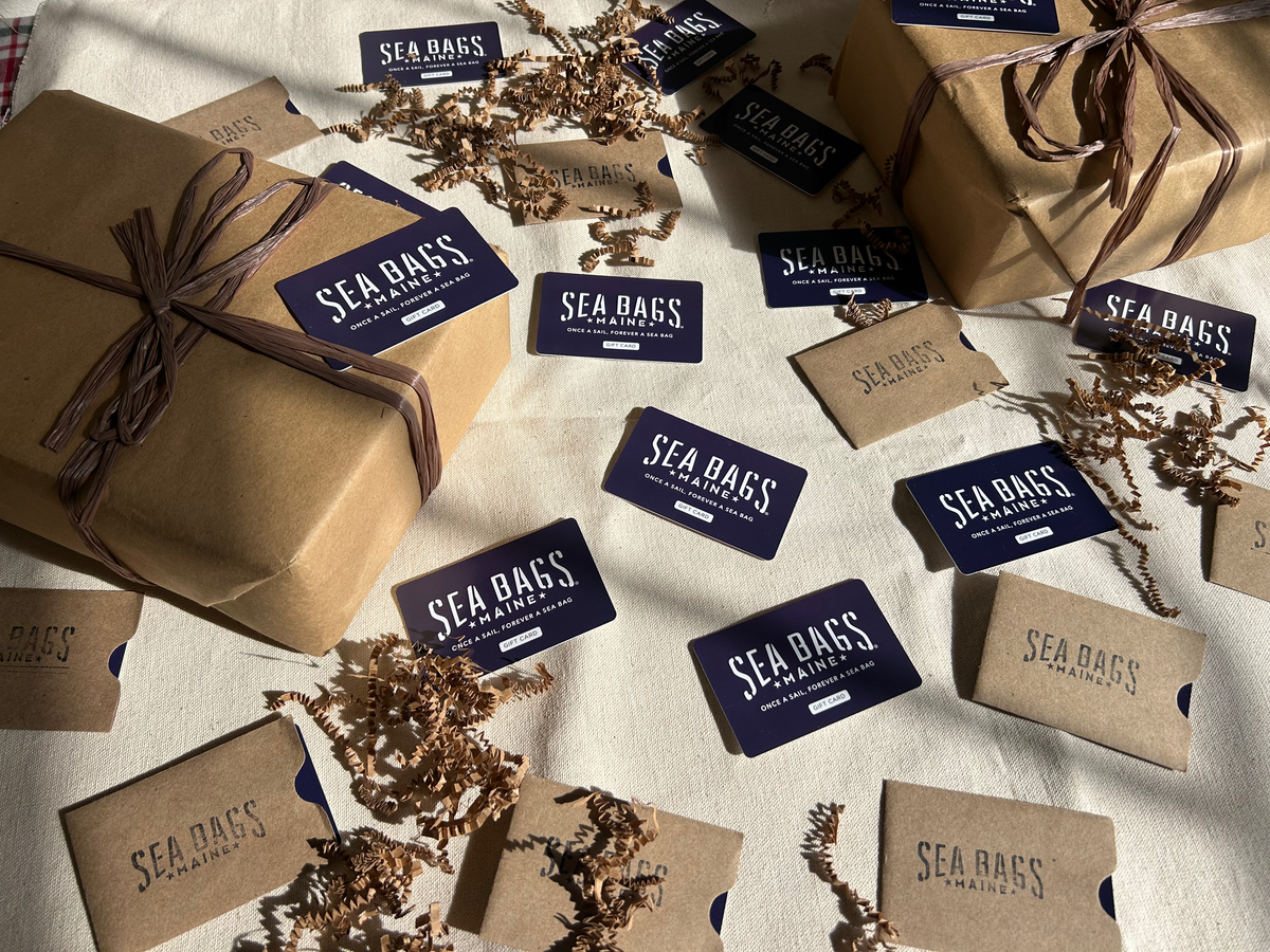 gift cards scattered on a table with gifts