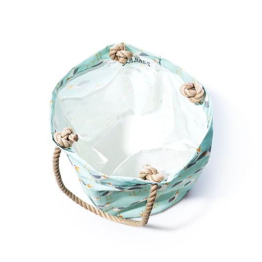 Beach bag with rope handles on a white background