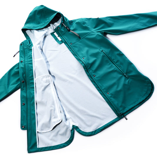 Green raincoat with white lining on a white background