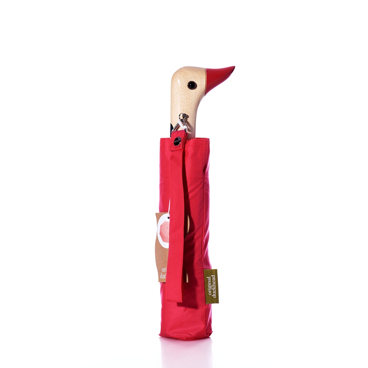 Red umbrella with a wooden duck handle on a white background