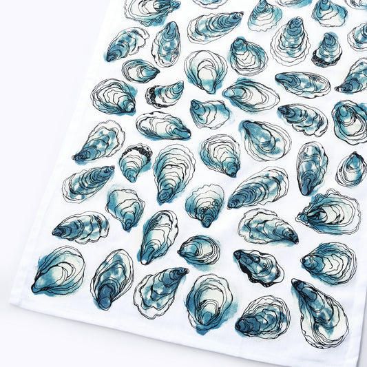 Pattern of blue and white oyster shells on a white background