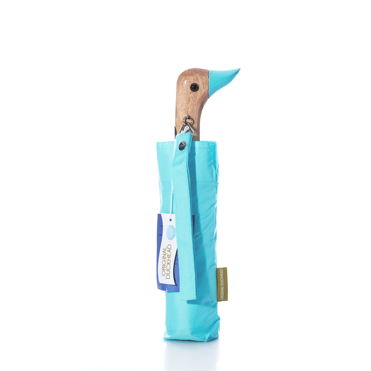 An Original Duck Head Umbrella - Popsicle Blue by ODH Limited t/a Original Duckhead stands closed and upright against a white background, featuring a popsicle blue canopy partially covering its distinctive wooden handle shaped like a duck’s head.