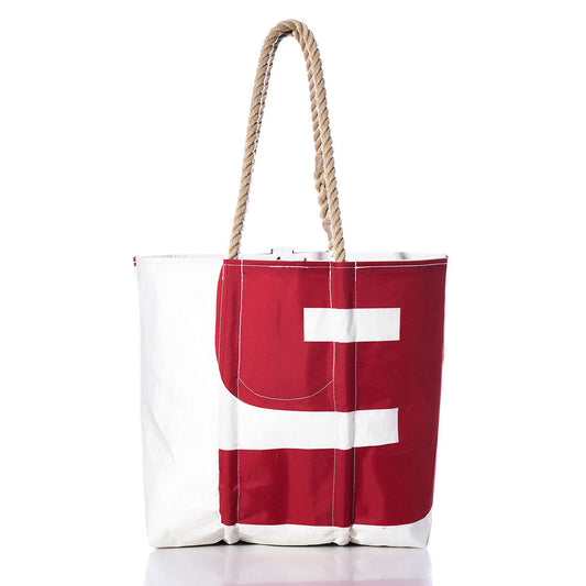 Sea Bags Vintage A9 Medium Tote in red and white sailcloth features sturdy rope handles and bold white stripes on the red panel, photographed against a white background. This handmade Maine tote blends timeless nautical design with durable craftsmanship, making it ideal for everyday use. by Sea Bags