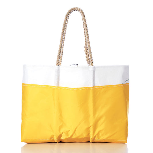 Sea Bags Vintage J70 Ogunquit Beach Tote in yellow and white, featuring rope handles and crafted from recycled sail cloth, photographed on a white background. by Sea Bags