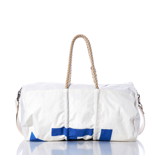 The Sea Bags Vintage 14 Duffel is a white bag with blue accents, featuring hemp rope handles and a tan shoulder strap. Crafted from recycled sail cloth, it is shown against a plain white background with a subtle reflection beneath it. by Sea Bags