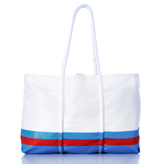 Tennessee Titans Tailgate Tote by Sea Bags, featuring two navy rope handles and two horizontal blue stripes near the bottom, crafted from recycled sail cloth, shown against a white background. by Sea Bags