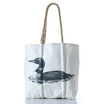 Sea Bags Loon Medium Tote made of white recycled sail cloth, featuring a black graphic of a swimming loon and two rope handles.