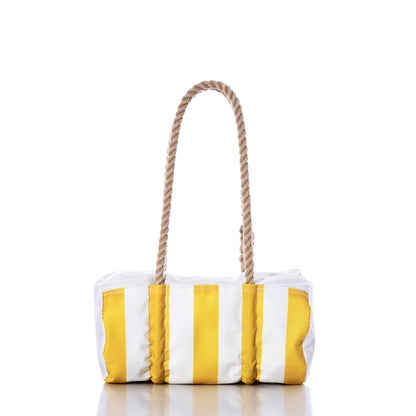 The Sun  Sea Stripe Baguette Bag by Sea Bags, featuring bold yellow and white nautical stripes and rope handles, is displayed against a white background. by Sea Bags