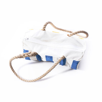 The Sun  Sea Stripe Baguette Bag by Sea Bags is a white, rectangular recycled sailcloth bag featuring blue accents, a zipper closure, and two thick braided rope handles, shown on a white background. by Sea Bags