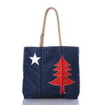 Navy tote bag with red tree and white star maine state flag design on a white background