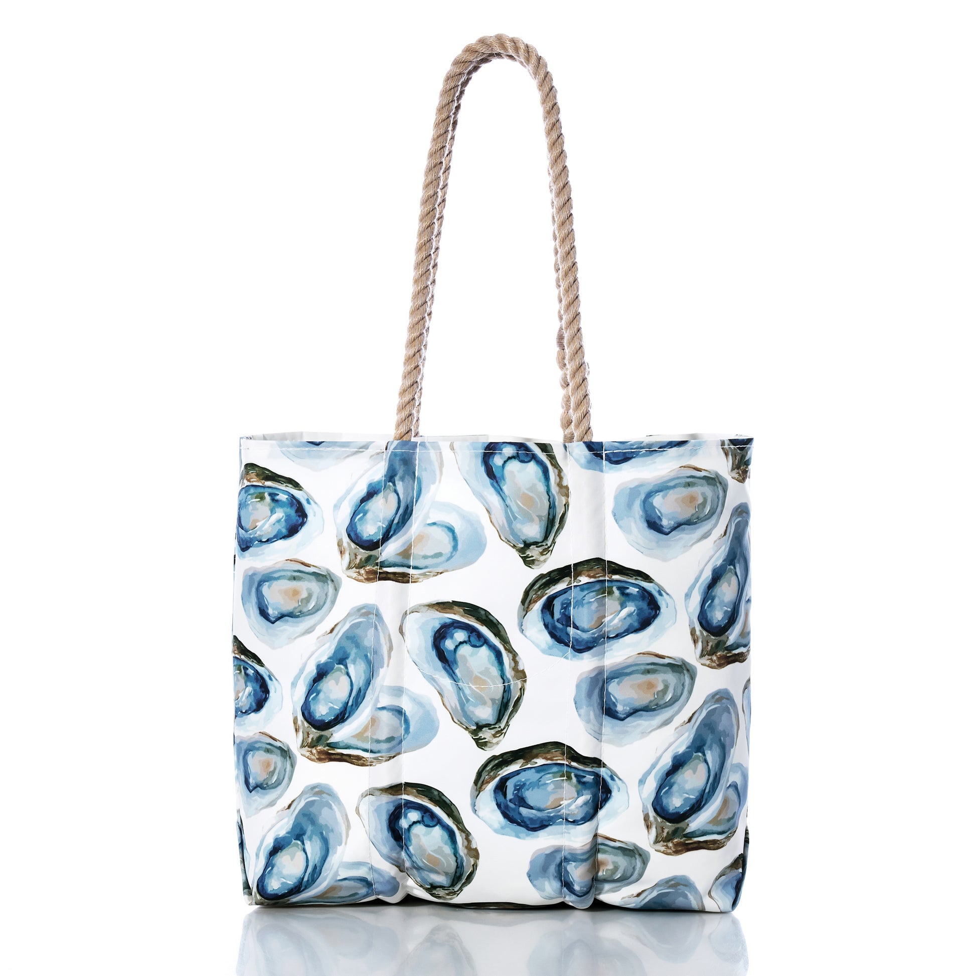 Tote bag with blue and white oyster dinner shell pattern on a white background