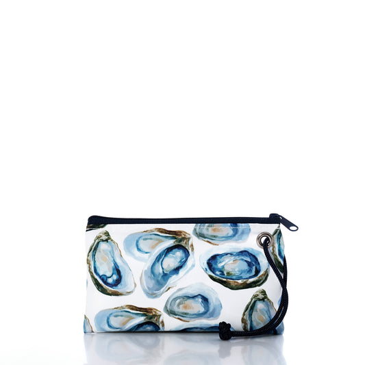 Wristlet with oyster shell pattern on a white background