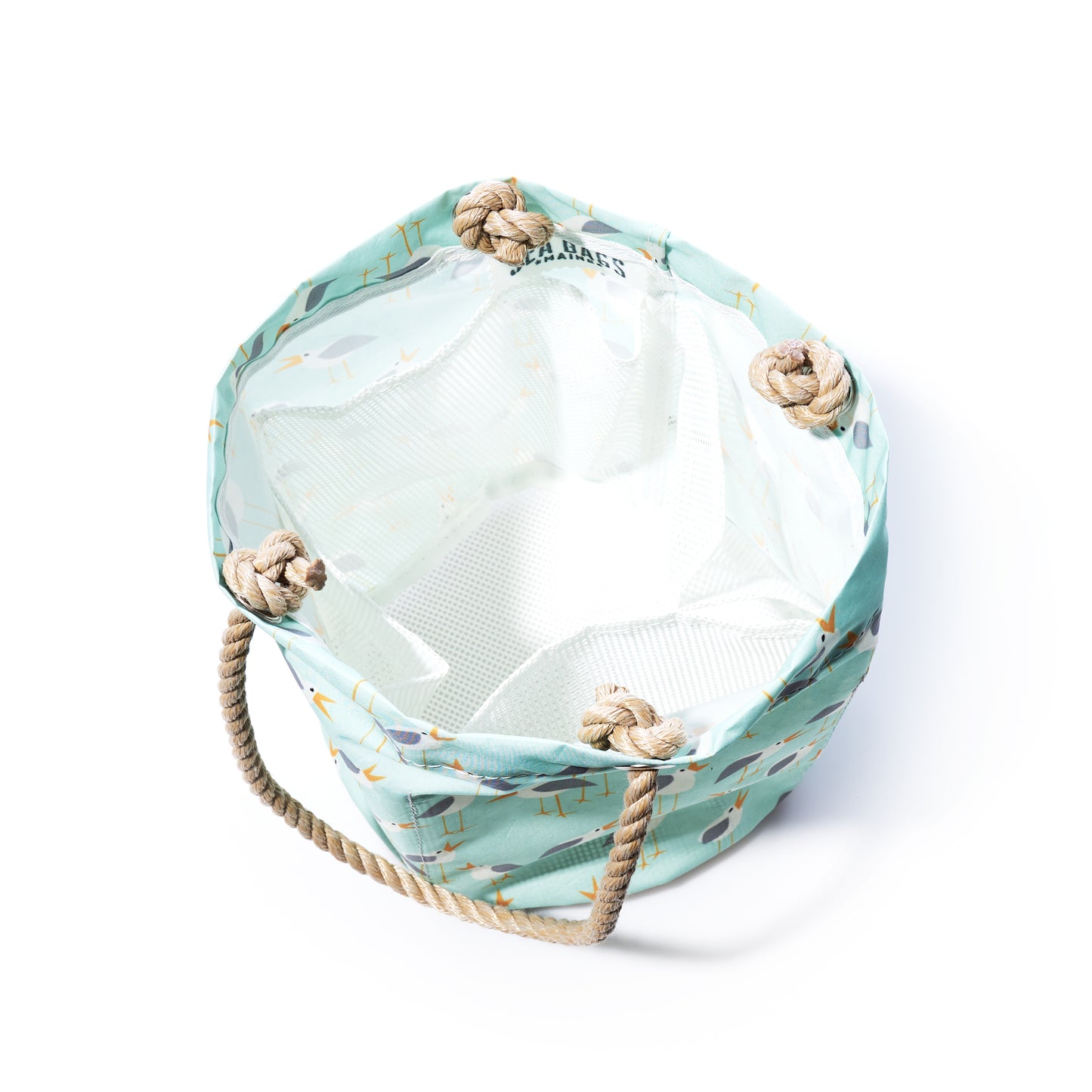 Beach bag with rope handles on a white background