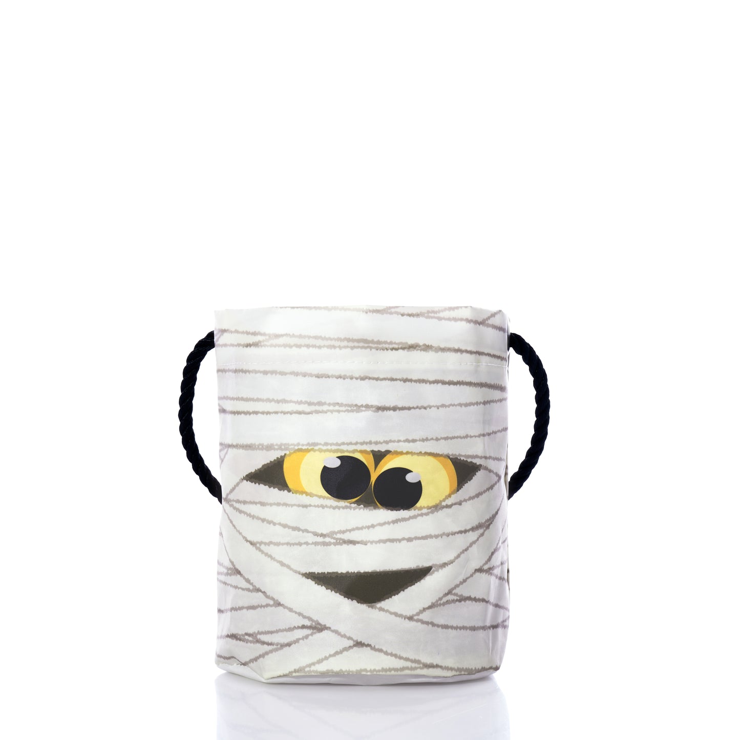 The Sea Bags Happy Mummy Bucket Bag is crafted from white recycled fabric and features yellow cartoon eyes, black rope handles, and a playful mummy-inspired design, shown on a white background. by Sea Bags