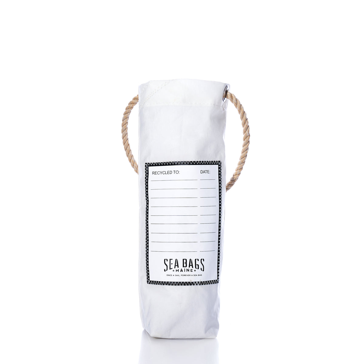 Red Star Wine Bag, a white cylindrical bag made from repurposed sails with rope handles and a printed label featuring fields for “Recycled to” and “Date.”