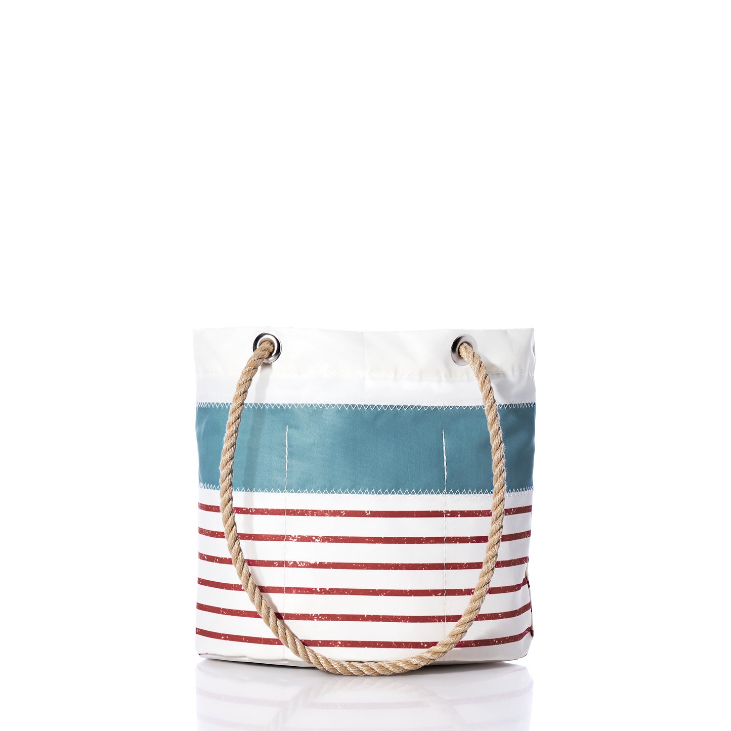 The Sea Bags Denim Blue-on-Red Mariner Stripe Essential Handbag features a white background adorned with bold red horizontal stripes and a denim blue accent stripe near the top, complemented by a sturdy rope handle. Crafted from recycled sail cloth, this lightweight and practical handbag is ideal for everyday use.
