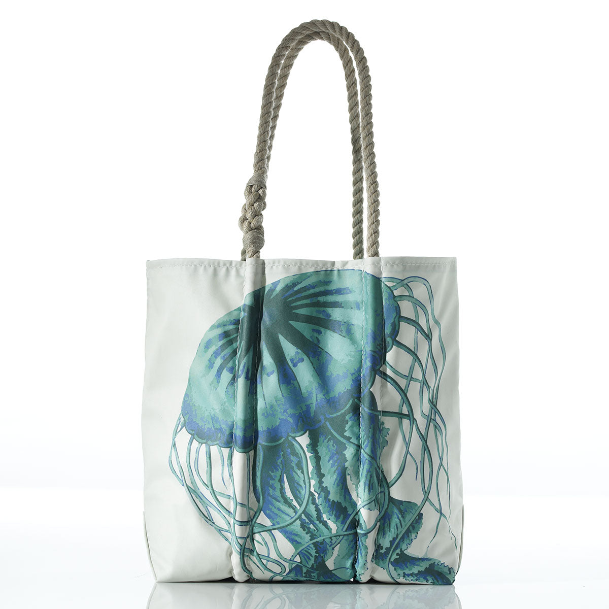 A white canvas tote bag with thick gray rope handles, featuring a large blue and teal jellyfish illustration printed on the front, set against a plain white background.