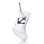 Navy Anchor Stocking with Personalized Sail Cloth Tag featuring a white eco-friendly sail-cloth design, a dark blue anchor, and a custom name tag reading “Charlotte.”