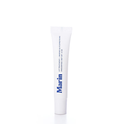 A white tube labeled “Marin Skincare” contains the Marin Lip Treatment - Unscented, a hydrating lip treatment with marine glycoproteins, displayed upright against a plain white background.