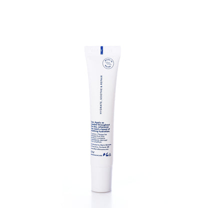 A white tube of Marin Skincare’s Marin Lip Treatment - Unscented stands upright on a white background, featuring blue text and a circular logo at the top. The packaging highlights its unscented formula infused with Marine Glycoproteins for an intensely hydrating lip treatment experience.