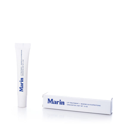 Marin Skincare Marin Lip Treatment - Unscented, a 0.5 oz hydrating lip treatment with marine glycoproteins, shown in a white squeeze tube beside its matching rectangular box.