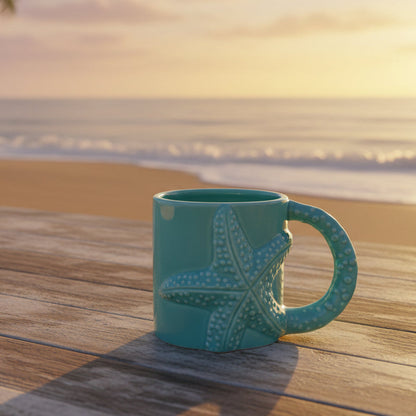 The Batela USA Inc Starfish Mug rests on a wooden table by the beach at sunrise, its sea-star texture catching the soft light as gentle waves and sky provide a tranquil ocean-themed backdrop.