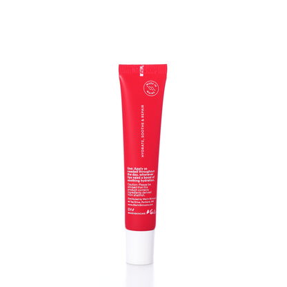 Red Marin Lip Treatment - Strawberry Rhubarb tube with white text, including instructions, ingredients, and a “Made in Maine” seal.