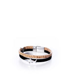 Bracelet with cork and black straps and a silver shark charm