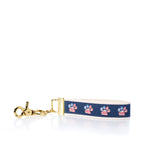 Keychain with paw print pattern on a white background