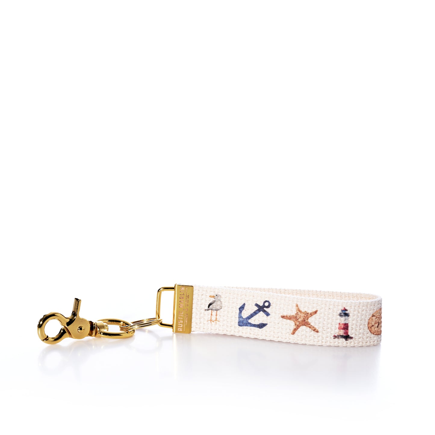Keychain with nautical-themed design on a white background