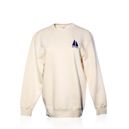 Cream-colored Sailboat Crewneck Sweatshirt featuring an embroidered navy blue sailboat icon and “SEA BAGS” text on the left chest.