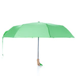 Original Duck Head Umbrella - Matcha Green with a light green duck head handle and a wooden shaft.