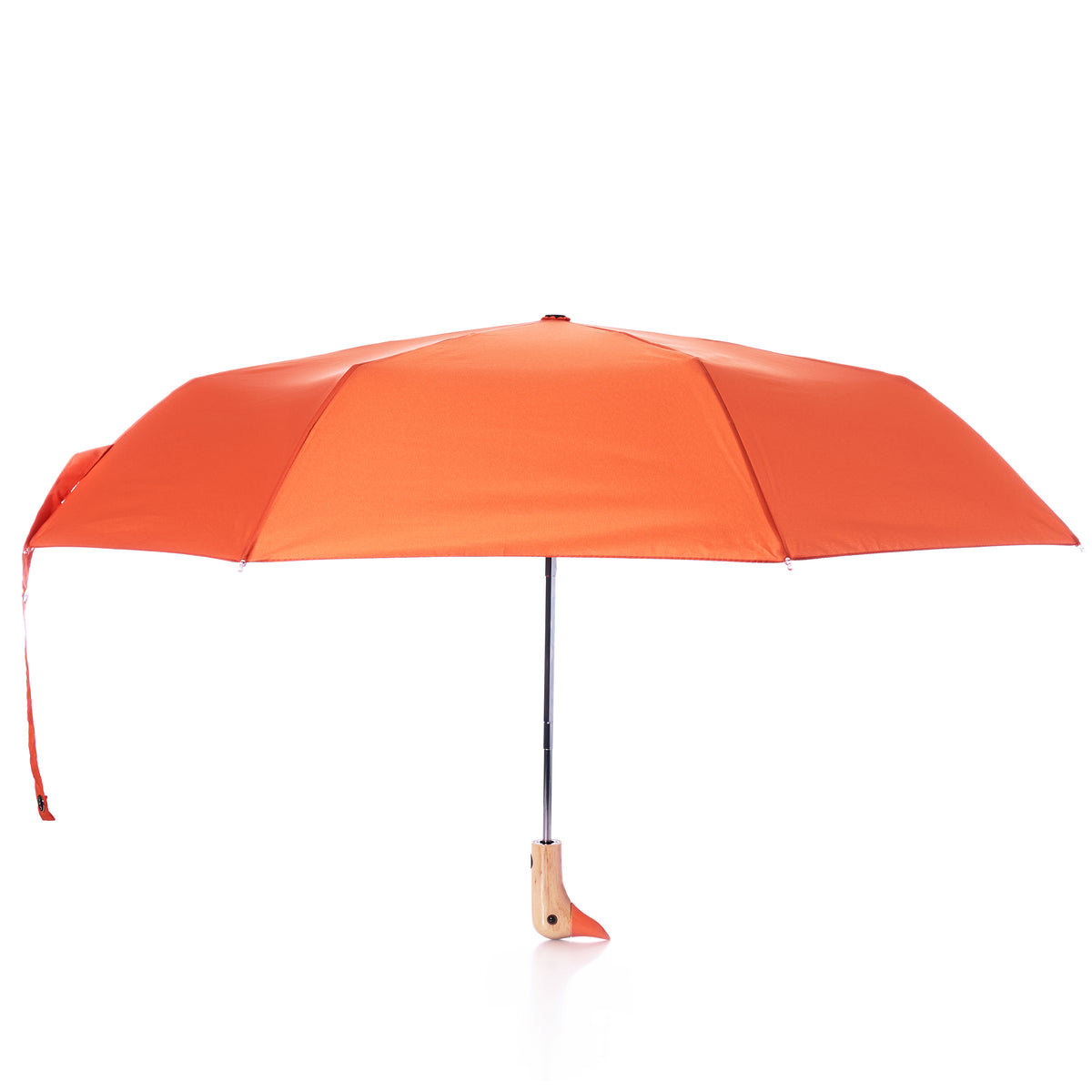 The Original Duck Head Umbrella - Papaya by ODH Limited t/a Original Duckhead is shown fully opened with its distinctive orange canopy, wooden handle, and wrist strap against a white background. This wind resistant umbrella blends classic style with dependable functionality.