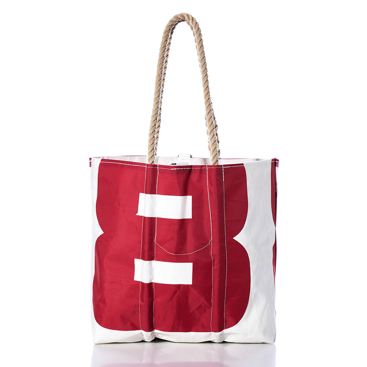 Sea Bags Vintage S8 Medium Tote showcases a bold letter B design on the front, crafted from original sail insignia for a classic vintage appeal. This red and white tote bag features hand-spliced rope handles and is set against a plain white background. by Sea Bags