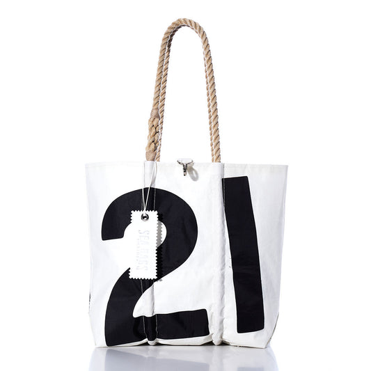 Introducing the Sea Bags Vintage 21 Medium Tote: a handmade white tote bag featuring a bold black number 21, sturdy rope handles, and an attached white tag—photographed on a white background and inspired by timeless nautical style. by Sea Bags