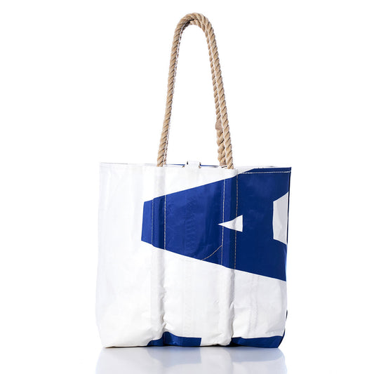 The Sea Bags Vintage USA Medium Tote is a large sailcloth bag featuring blue and white color blocks, white stitching, and two thick twisted rope handles, inspired by classic vintage tote styles—handmade in Maine and photographed against a white background. by Sea Bags