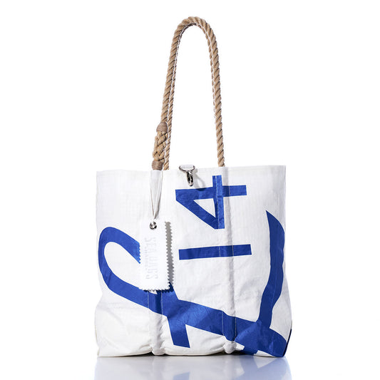 Sea Bags Vintage Lido 14 Medium Tote—this white tote bag features a bold blue number 14, hand-spliced rope handles, and an attached white tag. Photographed on a white background, it’s a classic handmade Maine bag crafted from recycled sails. by Sea Bags