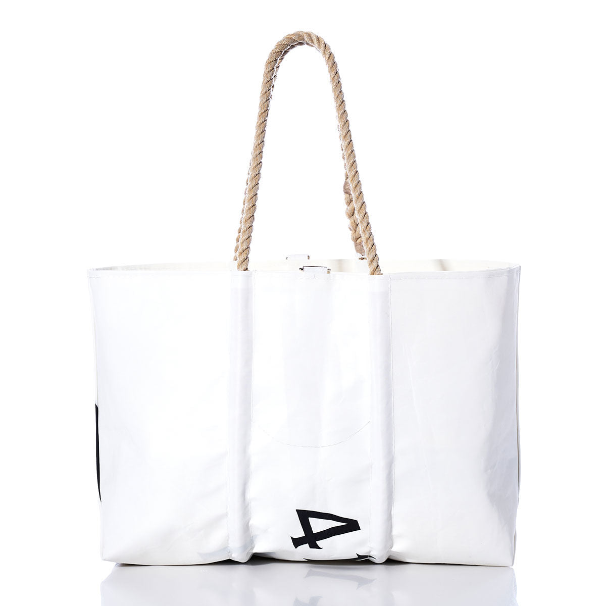 The Sea Bags Vintage Beneteau Large Tote is a handmade Maine bag crafted from large white sailcloth, featuring sturdy rope handles and a bold black number 4 printed near the bottom. Photographed on a white background, it evokes the timeless style of vintage Beneteau totes. by Sea Bags