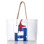 Sea Bags Vintage Albin Ballad Large Tote featuring hand-spliced rope handles, decorated with a prominent blue B, a red star, and an original sail insignia on a white tag near the handle, set against a white background. by Sea Bags
