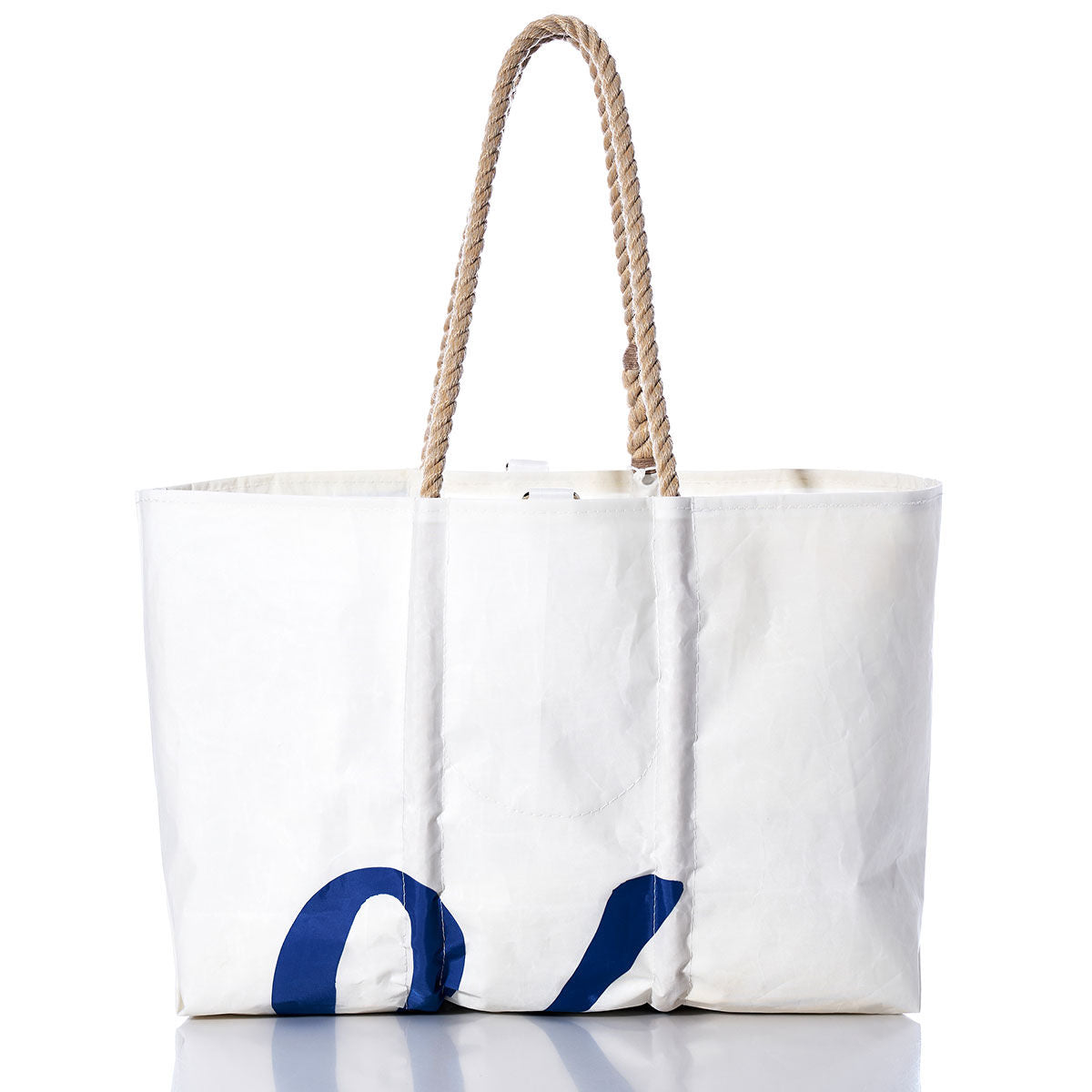 The Sea Bags Vintage J70 Large Tote is a handcrafted, rectangular sailcloth bag in white, featuring blue graphic lettering along the bottom and tan rope handles, displayed centered on a white background. by Sea Bags