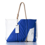 Vintage Blue Window Large Tote by Sea Bags, crafted from sailcloth with rope handles and featuring a stitched Sea Bags tag, showcased on a reflective surface against a white background. by Sea Bags