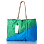 The Sea Bags Vintage Green and Blue Large Tote, featuring hand-spliced rope handles, visible stitching, green and blue panels, and a white tag attached, is displayed on a white background. by Sea Bags