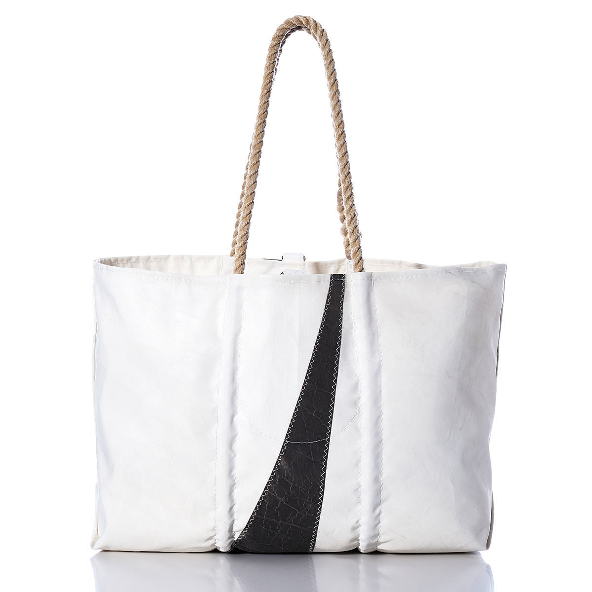 Sea Bags Vintage Pacific Seacraft Large Tote, featuring rope handles and a diagonal black accent inspired by classic Maine craftsmanship, is displayed on a reflective surface against a white background. by Sea Bags