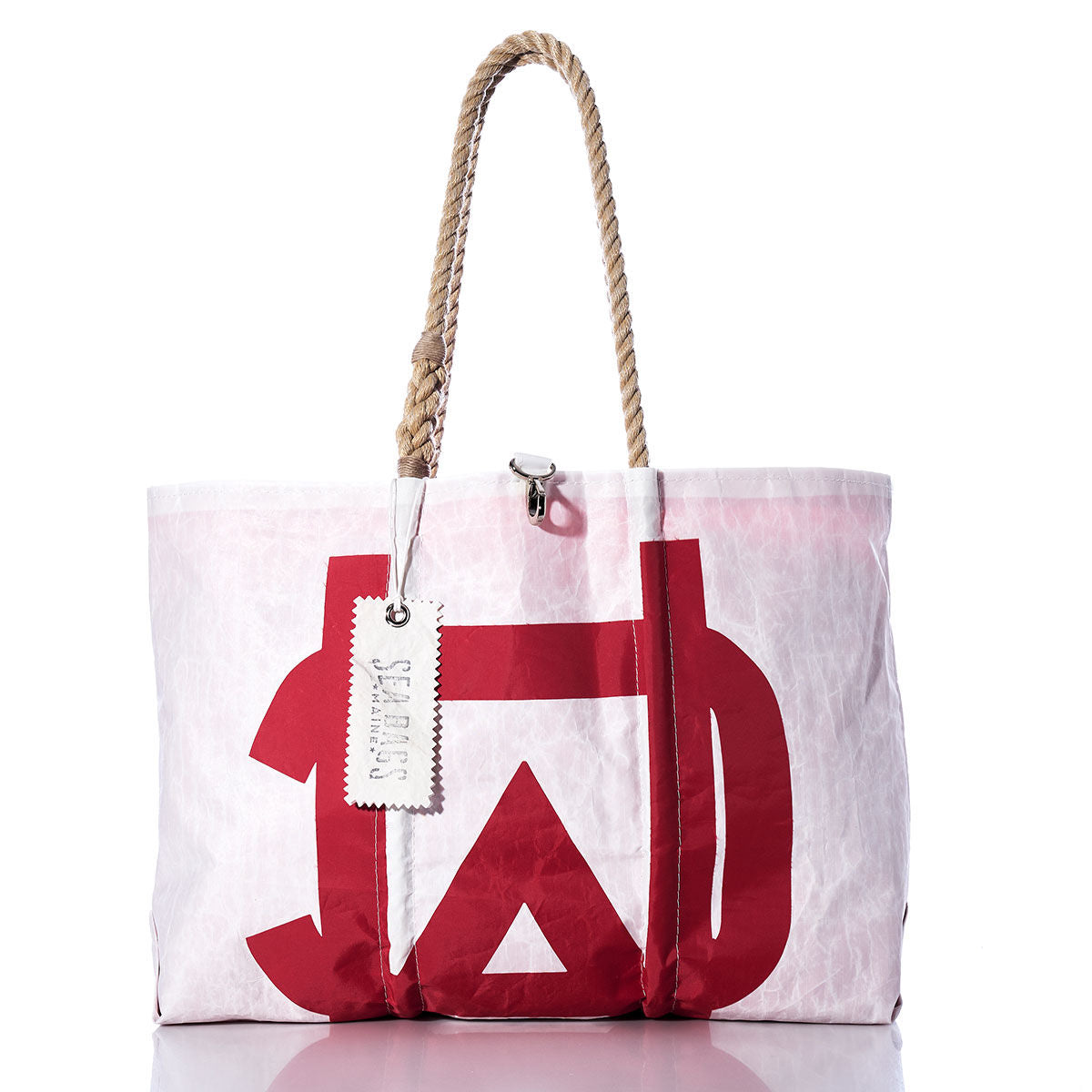 Introducing the Vintage Melges Large Tote by Sea Bags—a Maine-crafted white tote featuring a striking red graphic, hand-spliced rope handles, and a signature white Sea Bags tag for a blend of durability and coastal charm. by Sea Bags