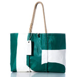 The Vintage 15 Large Tote by Sea Bags features green and white panels, hand-spliced rope handles, and a signature SEA BAGS tag. Photographed against a white background, this Maine-crafted tote perfectly embodies timeless style and classic craftsmanship inspired by vintage sail bags. by Sea Bags