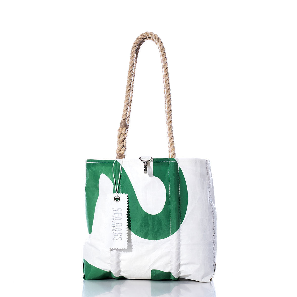 The Sea Bags Vintage Green 22 Handbag features a white and green color scheme with a curved green design, durable hemp rope handles, and a rectangular tag attached to one handle. Subtle sail insignias provide this tote with a timeless nautical touch. by Sea Bags