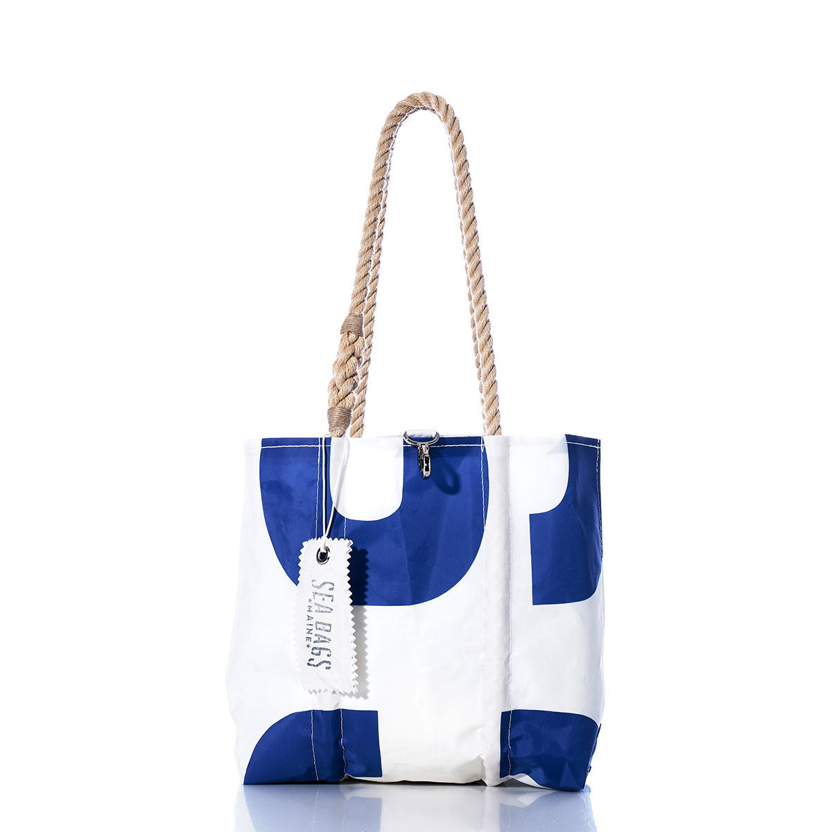Sea Bags Vintage Blue 63 Handbag with sail insignias and hemp rope handles, featuring a Sea Bags tag, photographed on a white background. by Sea Bags