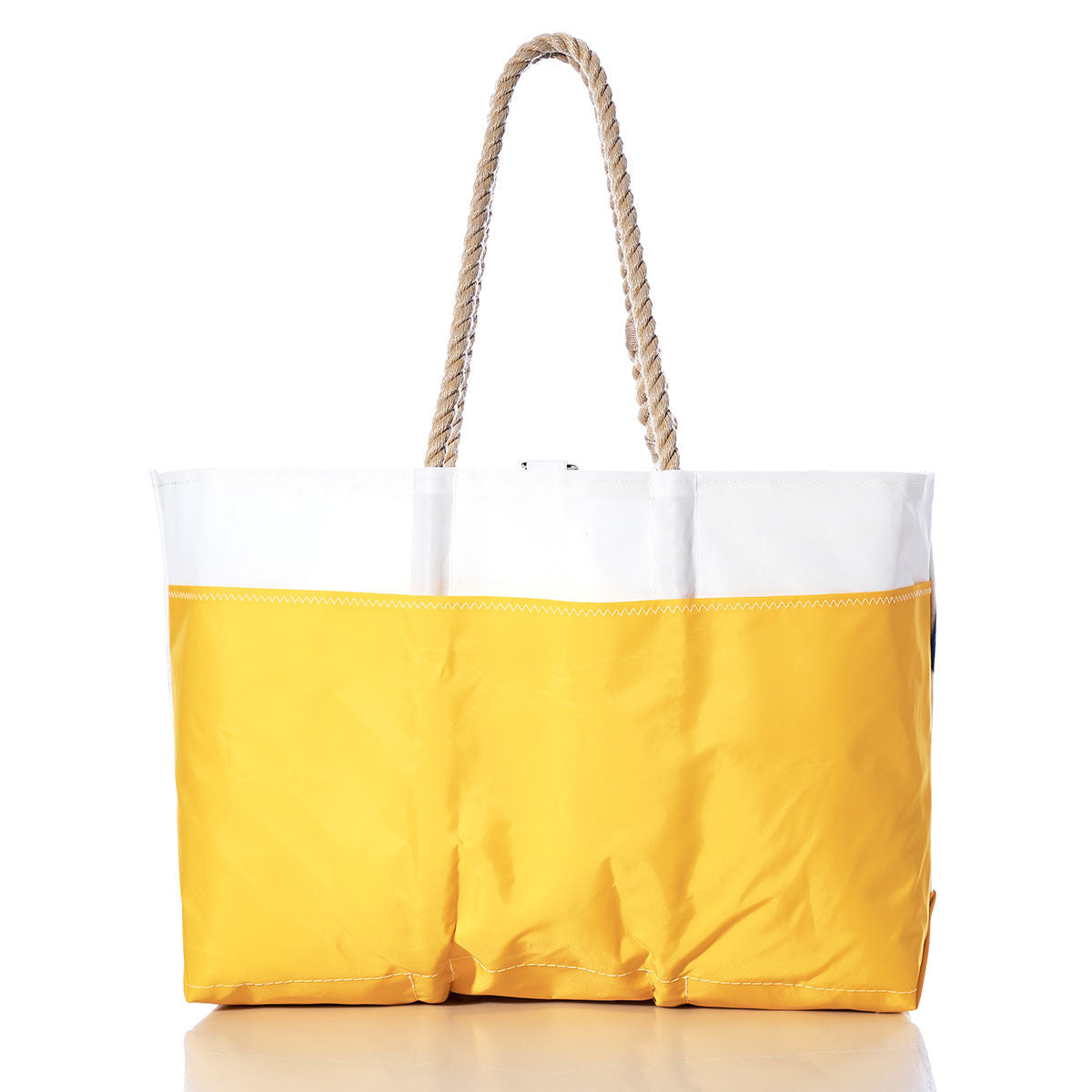 Introducing the Sea Bags Vintage J70 Ogunquit Beach Tote—a spacious rectangular beach tote made from recycled sail cloth, featuring a white top, yellow bottom, and sturdy rope handles. Its sail-inspired design captures vintage seaside charm, making it the perfect companion for your next coastal adventure. by Sea Bags