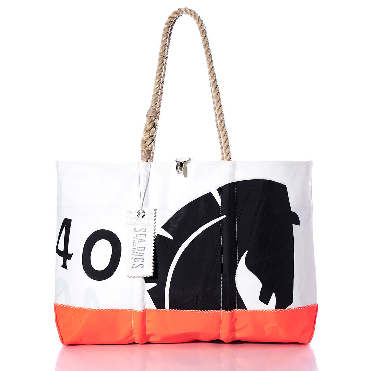 The Vintage Beneteau Ogunquit Beach Tote by Sea Bags features white and orange panels, sturdy rope handles, a black printed design, and a SEA BAGS tag. Crafted from recycled sail cloth, this tote bag is photographed against a white background. by Sea Bags