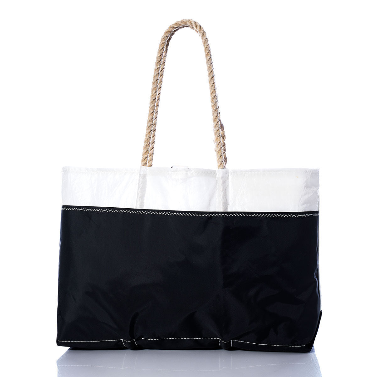 The Sea Bags Vintage Red C Ogunquit Beach Tote, featuring sturdy rope handles and crafted from recycled sail cloth, is displayed against a white background. by Sea Bags